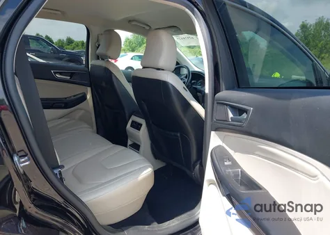 2022 Ford Edge Titanium z USA, uszkodzony, nr VIN 2FMPK4K94NBB05850